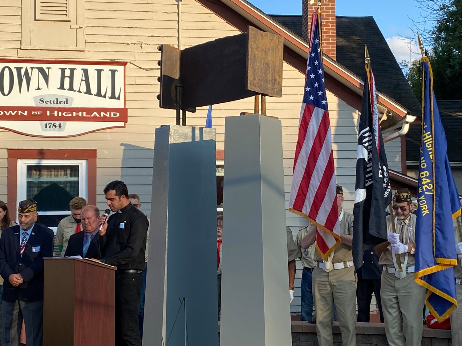 The Town of Highland Town Board organized the ceremony marking the 20th anniversary of September 11, 2001. Boy Scout Troop 102 stands behind the podium...
